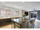 Modern kitchen featuring a large island and stainless steel appliances at 11091 Parete Ct, Las Vegas, NV 89141
