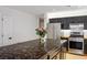 Charming kitchen with a large island and stainless steel appliances at 11091 Parete Ct, Las Vegas, NV 89141