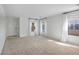 Large living room filled with natural light from multiple windows at 11091 Parete Ct, Las Vegas, NV 89141