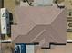 Bird's-eye view of a well-maintained tile roof, adjacent to a recreational vehicle and providing residential charm at 1131 China St, Pahrump, NV 89048
