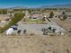 Large lot with ample parking, outbuildings, and outdoor potential, presenting opportunities for customization and expansion at 1131 China St, Pahrump, NV 89048