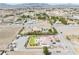 An aerial view displays single-Gathering homes within a community, each with unique landscaping at 1131 China St, Pahrump, NV 89048