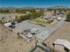 Extensive property with abundant parking, additional structures, and outdoor possibilities, ideal for storage and recreational use at 1131 China St, Pahrump, NV 89048
