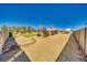 Spacious yard features desert landscaping, providing a low-maintenance outdoor space at 1131 China St, Pahrump, NV 89048