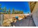Fenced-in backyard featuring designated planting areas and landscaping potential at 1131 China St, Pahrump, NV 89048
