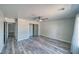 Bedroom featuring wood flooring and a closet with sliding doors at 1131 China St, Pahrump, NV 89048