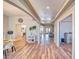 Inviting foyer with wood-look flooring, recessed lighting, and decorative accents leading into an open-concept layout at 1131 China St, Pahrump, NV 89048