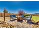 Cozy backyard area with desert landscaping, paver patio, and outdoor furniture, perfect for relaxing at 1131 China St, Pahrump, NV 89048