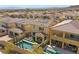Aerial view of backyard featuring a pool, hot tub, and covered patio at 11826 Corenzio Ave, Las Vegas, NV 89138