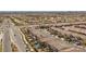 Gorgeous aerial view of a residential neighborhood with lush landscaping, pools, and well-maintained streets at 11826 Corenzio Ave, Las Vegas, NV 89138