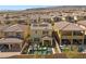 Aerial view of backyard featuring a pool, hot tub and patio at 11826 Corenzio Ave, Las Vegas, NV 89138