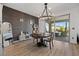 Inviting dining area with natural light and a sliding glass door leading to an outdoor seating area at 11826 Corenzio Ave, Las Vegas, NV 89138