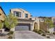 Charming two-story home boasts a neutral color palette, tile roof, and a paved driveway and walkway at 11826 Corenzio Ave, Las Vegas, NV 89138
