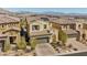 Charming two story home with neutral colors, tile roof and two car garage at 11826 Corenzio Ave, Las Vegas, NV 89138