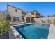 Backyard pool, spa, and patio area provide a perfect outdoor oasis at 11826 Corenzio Ave, Las Vegas, NV 89138