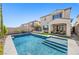 Beautiful backyard showcasing a private pool and outdoor entertaining area at 11826 Corenzio Ave, Las Vegas, NV 89138