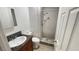 A beautifully renovated bathroom with a walk-in shower and a marble vanity at 1308 Harriet St, Las Vegas, NV 89101