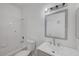 Bathroom with white tiled shower, vanity, toilet, and modern fixtures at 1840 N Jones Blvd, Las Vegas, NV 89108