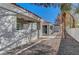 Close-up of stucco home with red tile roof and covered porch at 1840 N Jones Blvd, Las Vegas, NV 89108