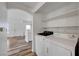 Convenient laundry area with washer, dryer, and shelving at 1840 N Jones Blvd, Las Vegas, NV 89108