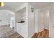 Laundry room with an overhead shelf for supplies is next to a doorway to the half bathroom at 1840 N Jones Blvd, Las Vegas, NV 89108