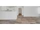 Open floor plan with wood-look floors and white walls at 1840 N Jones Blvd, Las Vegas, NV 89108
