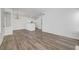Inviting living room boasts an open layout, wood-look flooring, and a seamless transition to the kitchen area at 1840 N Jones Blvd, Las Vegas, NV 89108