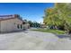 A backyard with a basketball hoop, playground, pool, and concrete pad at 1853 Heydon Ct, Henderson, NV 89014