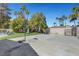 Features a basketball hoop, playground, and concrete pad, offering versatile recreational space at 1853 Heydon Ct, Henderson, NV 89014