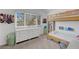 Bright bedroom with a bunk bed, a dresser, and a view to the backyard at 1853 Heydon Ct, Henderson, NV 89014