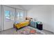Cozy bedroom featuring a twin bed, window with blinds, and colorful rug at 1853 Heydon Ct, Henderson, NV 89014