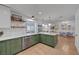 Beautiful kitchen with an island, white countertops, and seating for four at 1853 Heydon Ct, Henderson, NV 89014