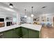 Bright, open kitchen features custom cabinets, large countertops, and modern lighting at 1853 Heydon Ct, Henderson, NV 89014