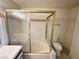 Bathroom featuring a vanity, toilet and a shower/tub with glass doors at 1964 Las Palmas Ln # 244, Laughlin, NV 89029
