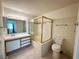 Bathroom featuring a vanity, toilet and a shower/tub with glass doors at 1964 Las Palmas Ln # 244, Laughlin, NV 89029