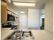 Functional kitchen featuring essential appliances and ample counter space at 1964 Las Palmas Ln # 244, Laughlin, NV 89029