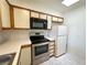 Bright kitchen with stainless steel appliances and ample cabinet storage at 1964 Las Palmas Ln # 244, Laughlin, NV 89029