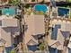 Stunning aerial view showcasing a backyard pool and spa in a residential neighborhood at 2163 Fountain Springs Dr, Henderson, NV 89074