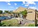 Expansive backyard with a pool, spa, and well-maintained lawn, perfect for outdoor gatherings and relaxation at 2163 Fountain Springs Dr, Henderson, NV 89074