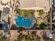 Aerial view of a backyard featuring a sparkling blue pool and mature landscaping at 2163 Fountain Springs Dr, Henderson, NV 89074