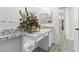 Bathroom boasts granite countertops, storage space, and a decorative flower arrangement at 2163 Fountain Springs Dr, Henderson, NV 89074