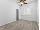 Bedroom with modern windows, closet space and hard wood floors and a ceiling fan at 2163 Fountain Springs Dr, Henderson, NV 89074