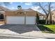 Lovely single-story home featuring a two-car garage and desert landscaping at 2163 Fountain Springs Dr, Henderson, NV 89074