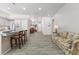 An open living space seamlessly connects the kitchen, dining area, and living room at 2163 Fountain Springs Dr, Henderson, NV 89074