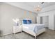Comfortable bedroom with wood floors, chandelier, and double closets at 2163 Fountain Springs Dr, Henderson, NV 89074