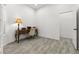 Cozy office space with stylish desk and chair, ample natural light, and wood-look tile flooring at 2163 Fountain Springs Dr, Henderson, NV 89074