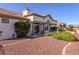 A well maintained patio and landscaping with decorative rock detail and mature bushes at 2212 Sierra Heights Dr, Las Vegas, NV 89134