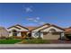 Charming single-story home with a well-maintained front yard, tiled roof, and two car garage at 2212 Sierra Heights Dr, Las Vegas, NV 89134
