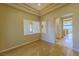 Open-concept living room with hardwood floors and views into the dining room and kitchen at 2212 Sierra Heights Dr, Las Vegas, NV 89134