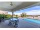 Outdoor patio with a pool, a putting green, and stunning mountain views at 2212 Sierra Heights Dr, Las Vegas, NV 89134